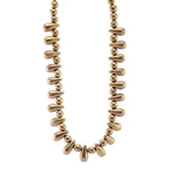 Round and pera shaped handmade beads come together in a necklace